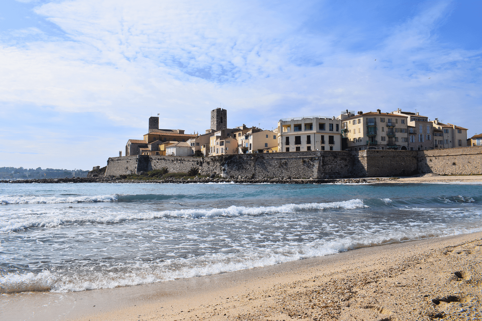 beach and historic building in Antibes, France